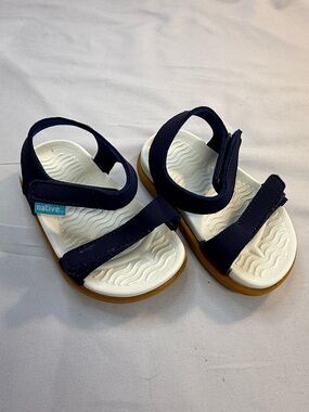 Native Blue and White Sporty Sandals with Water-Friendly Design